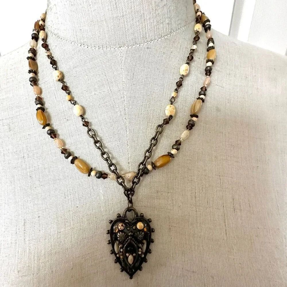 Brown beaded double strandโheart pendant necklace